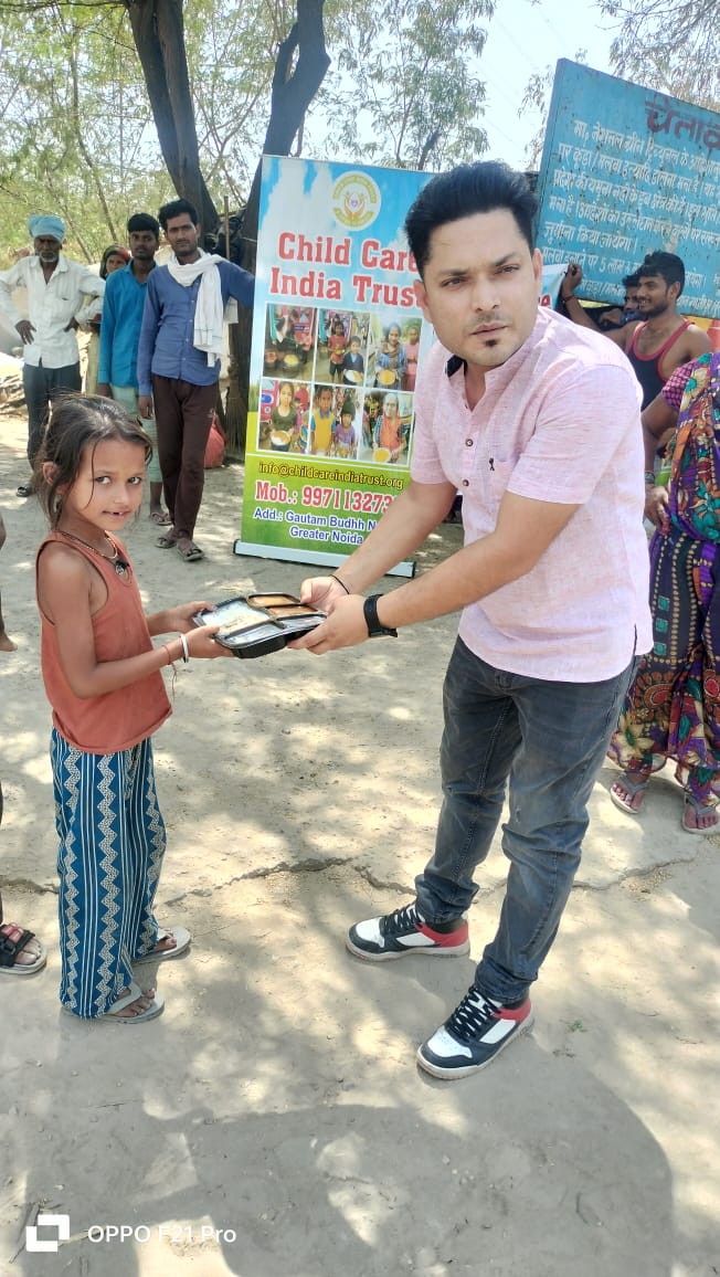 Community meal distribution event by Child Care India Trust